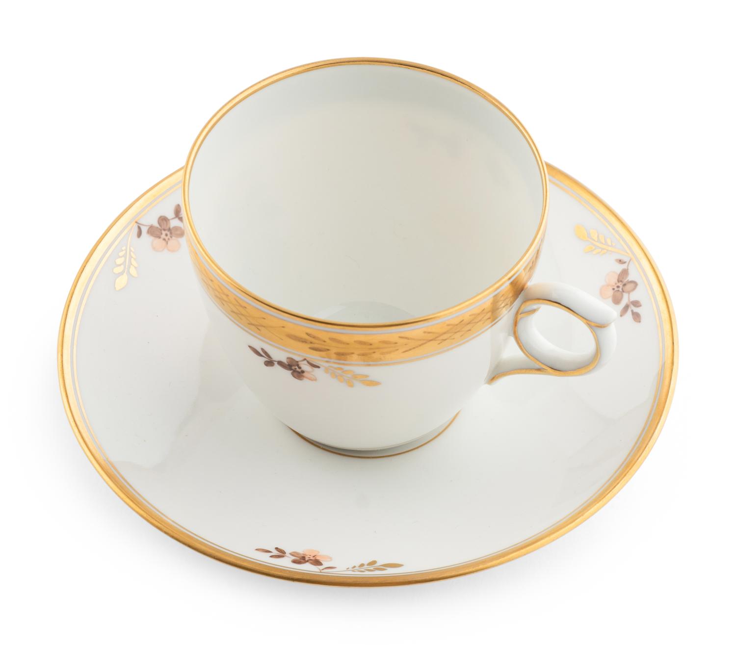A Royal Copenhagen Golden Basket Porcelain Dinner Service
