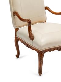 A Set of Four Régence Style Leather-Upholstered Armchairs