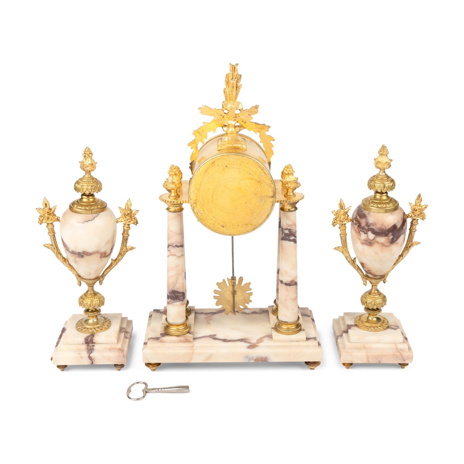 A French Gilt Bronze Mounted Marble Clock Garniture