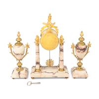 A French Gilt Bronze Mounted Marble Clock Garniture