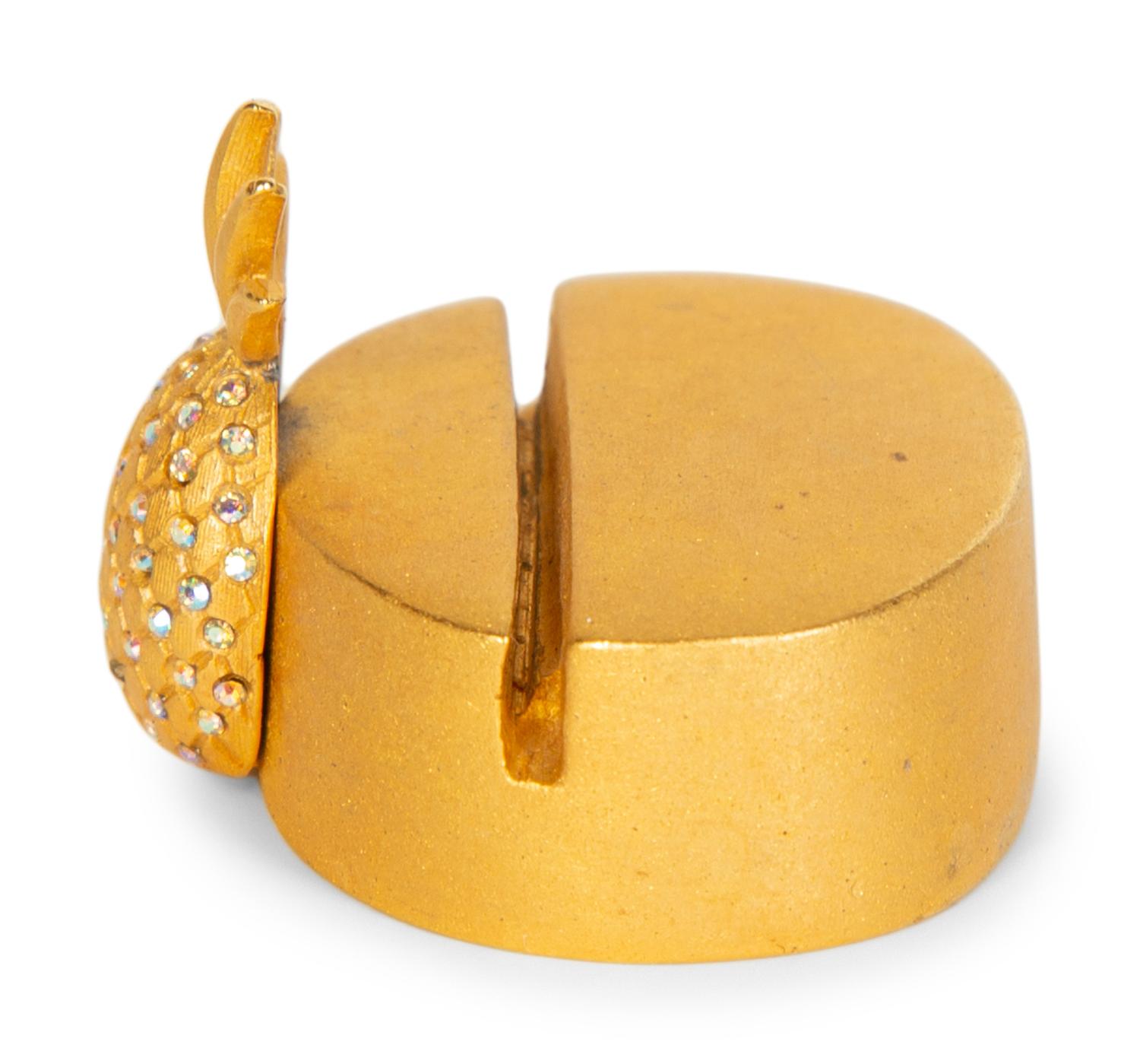 A Large Collection of Napkin Rings, Place Card Holders, and Utensil Rests