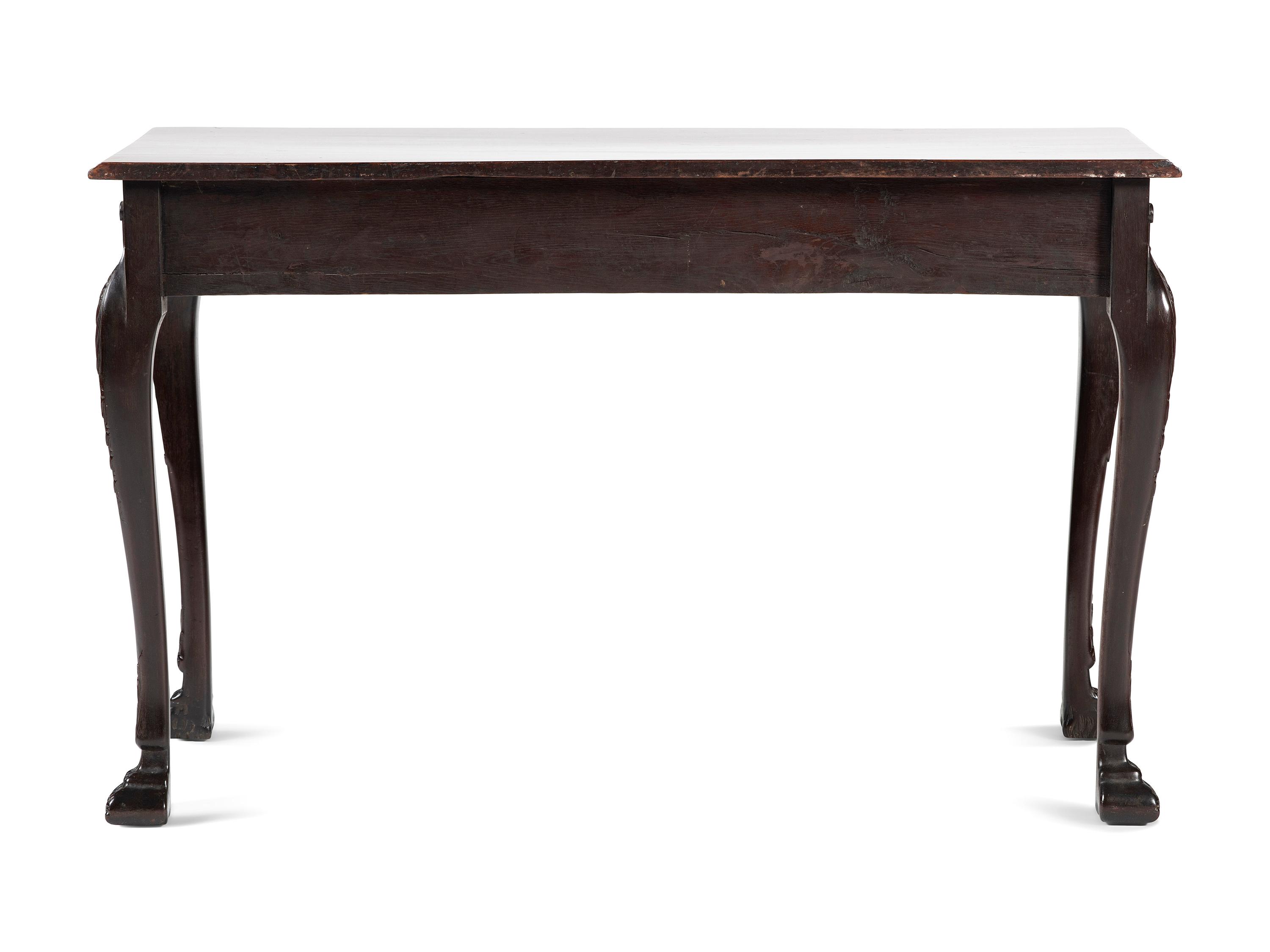 An Irish George III Shell, Acanthus and Bell-Flower Carved and Figured Mahogany Hairy Paw Foot Side Table
