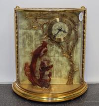 A Chinese Brass and Carved Hardstone Mantel Clock. Height 10 3/4 inches.