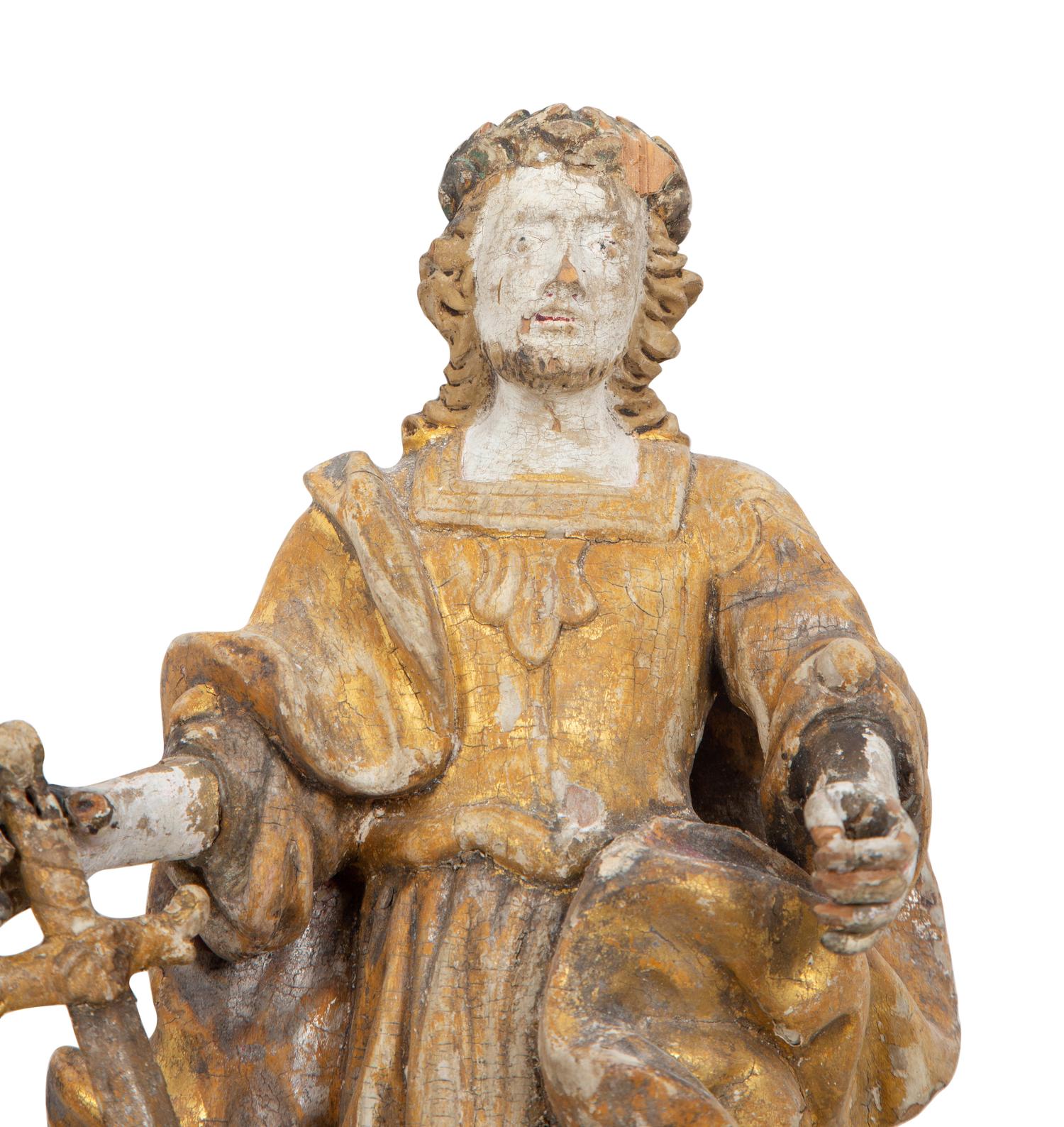 A Near Pair of Italian Carved Wood Figural Two-Light Sconces with Iron Mounts