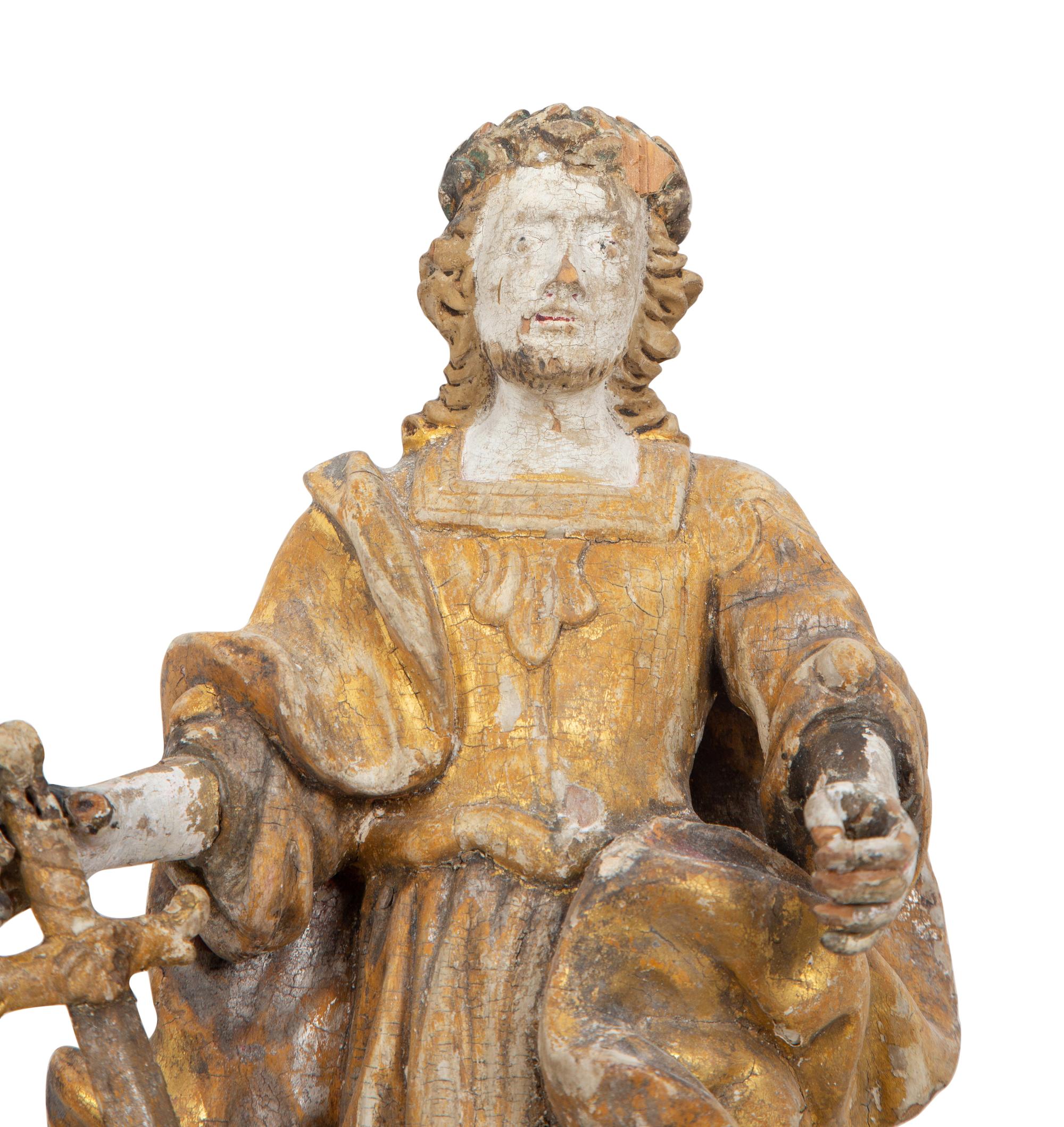 A Near Pair of Italian Carved Wood Figural Two-Light Sconces with Iron Mounts