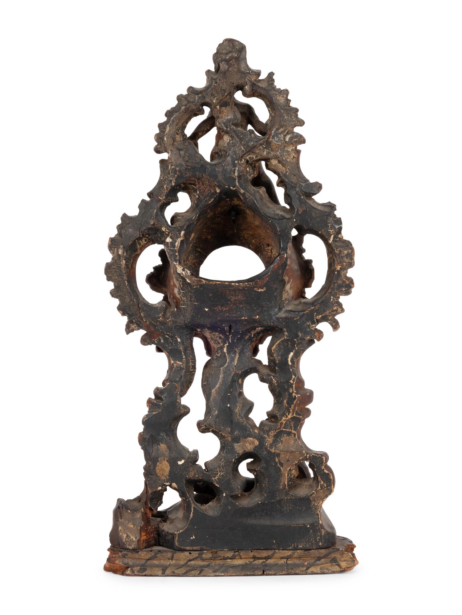 A Continental Rococo Style Carved Fruitwood Watch Stand