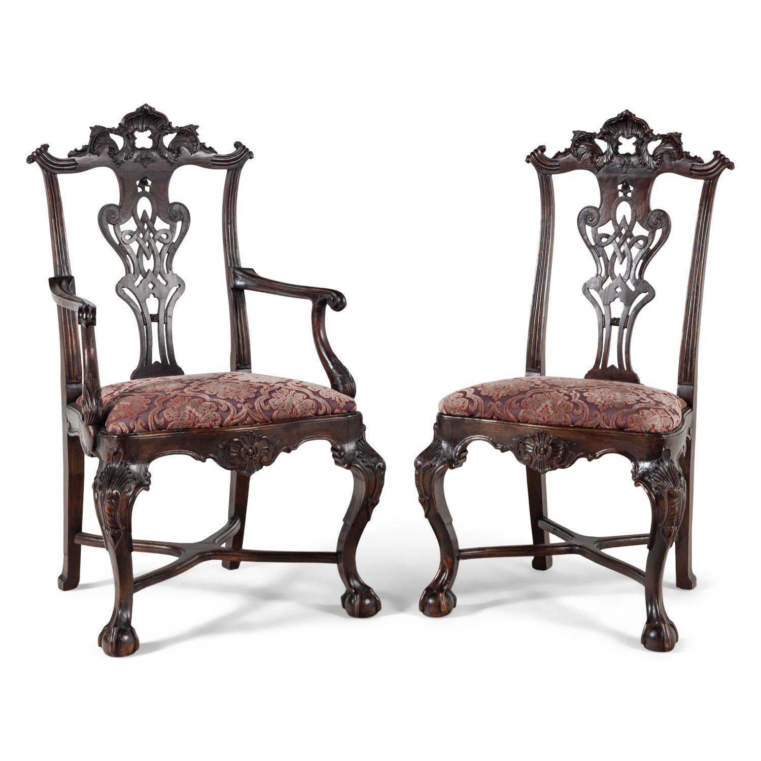 An Italian Rococo Style Carved Mahogany Nine-Piece Seating Suite