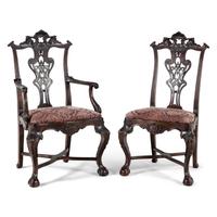 An Italian Rococo Style Carved Mahogany Nine-Piece Seating Suite