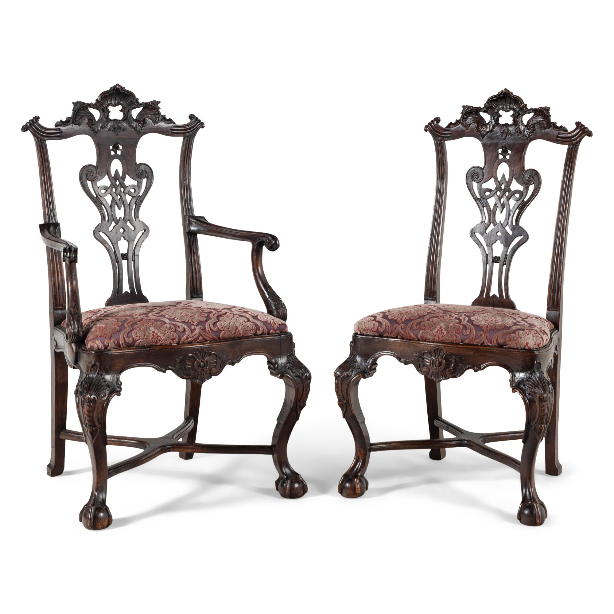 An Italian Rococo Style Carved Mahogany Nine-Piece Seating Suite
