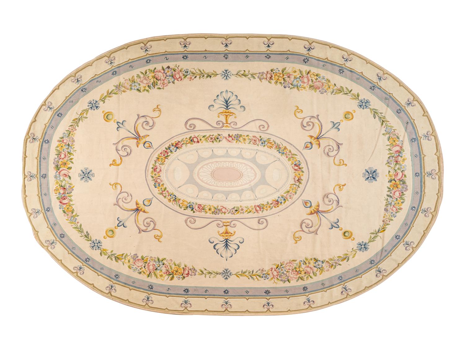 An Aubusson Style Oval Rug