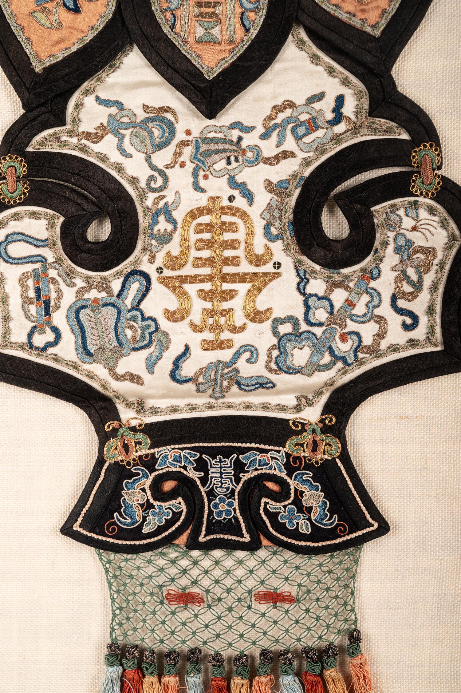 Six Embroidered Silk Rank Badges and a Cloud Collar