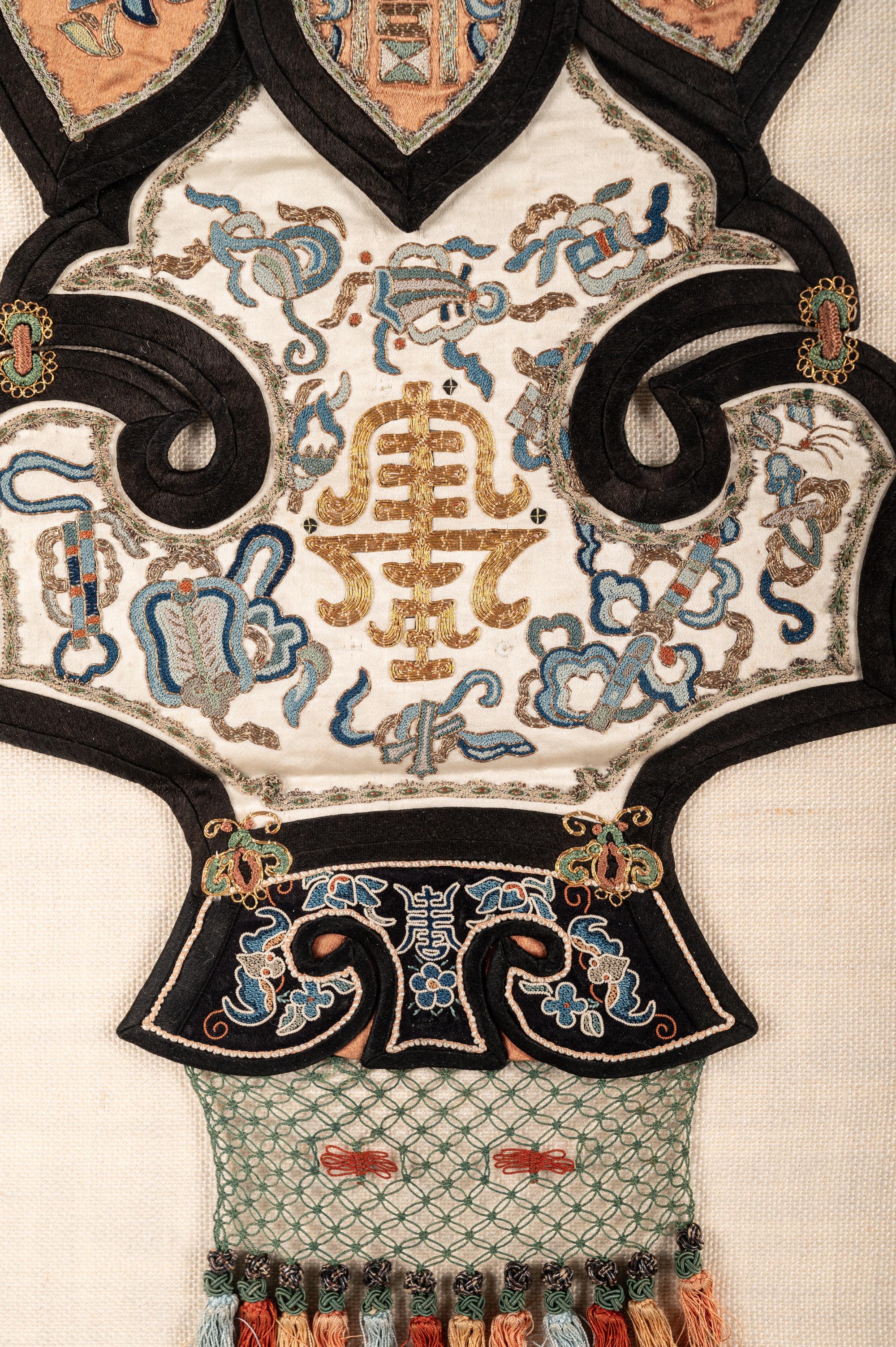Six Embroidered Silk Rank Badges and a Cloud Collar