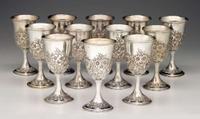 Twelve sterling silver repoussé goblets s. kirk & son, baltimore, md, 19th/20th century