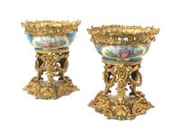 A Pair of Sevres Style Porcelain and Gilt Bronze Mounted Center Bowls, Height 12 1/2 inches.