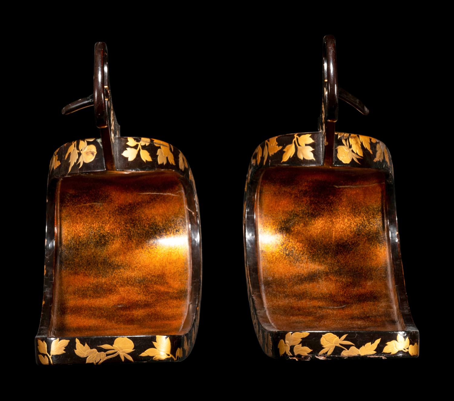 A Pair of Japanese Gold and Black Lacquered Stirrups