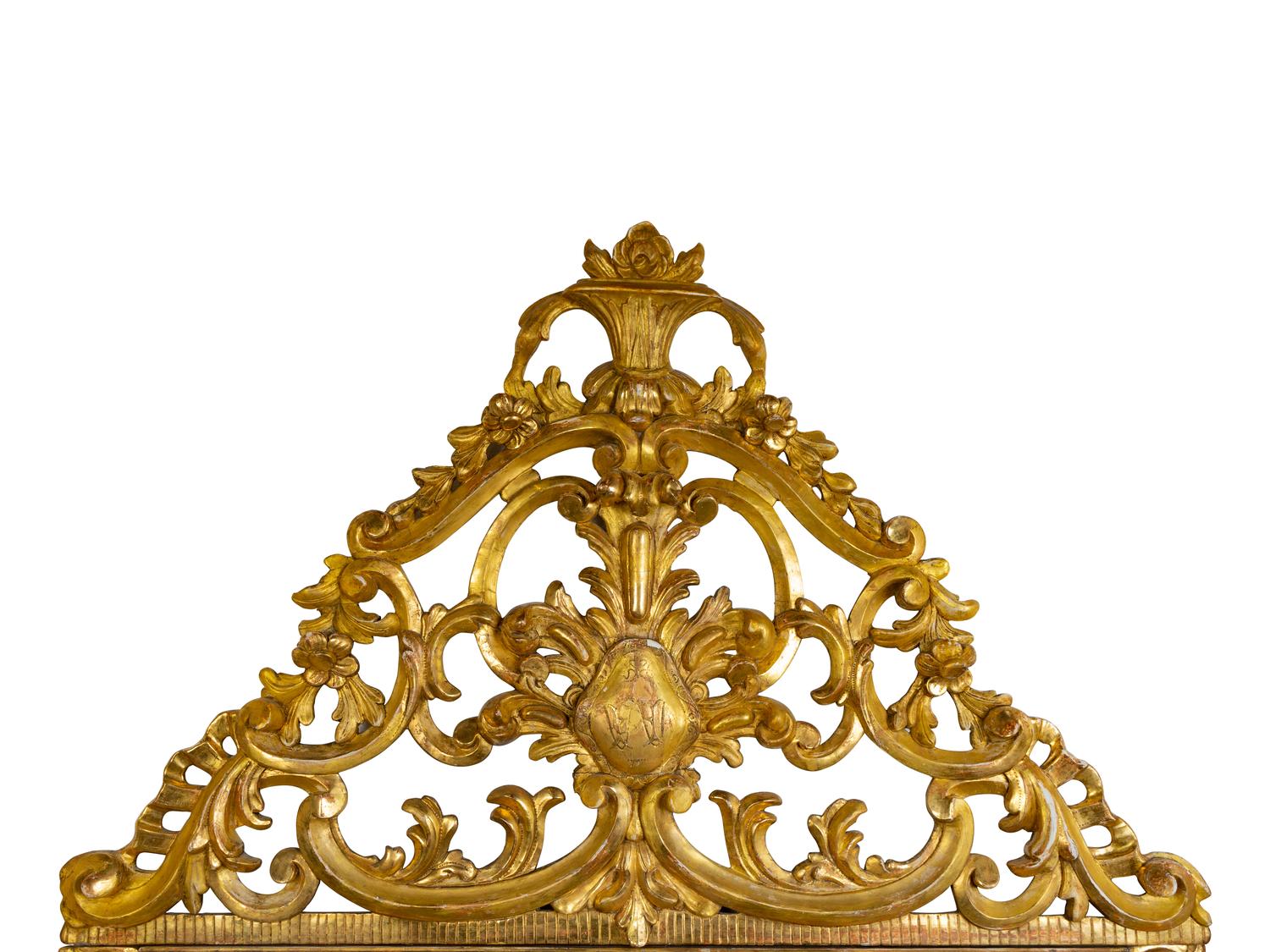 An Italian Baroque Style Giltwood Mirror