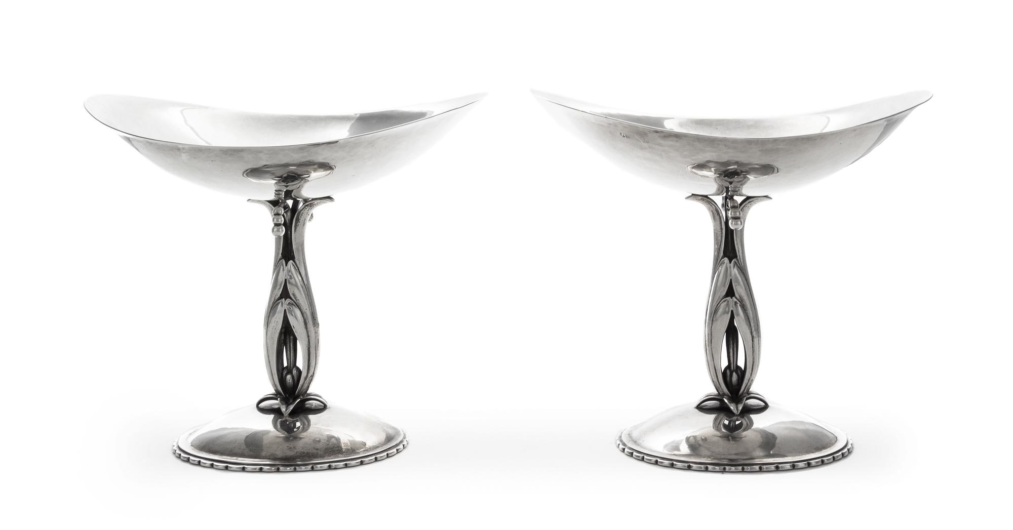 A Pair of American Silver Compotes, Cellini Craft, Ltd., Chicago, IL, 1940, each of oval boat form, raised on an openwork leaf stem top