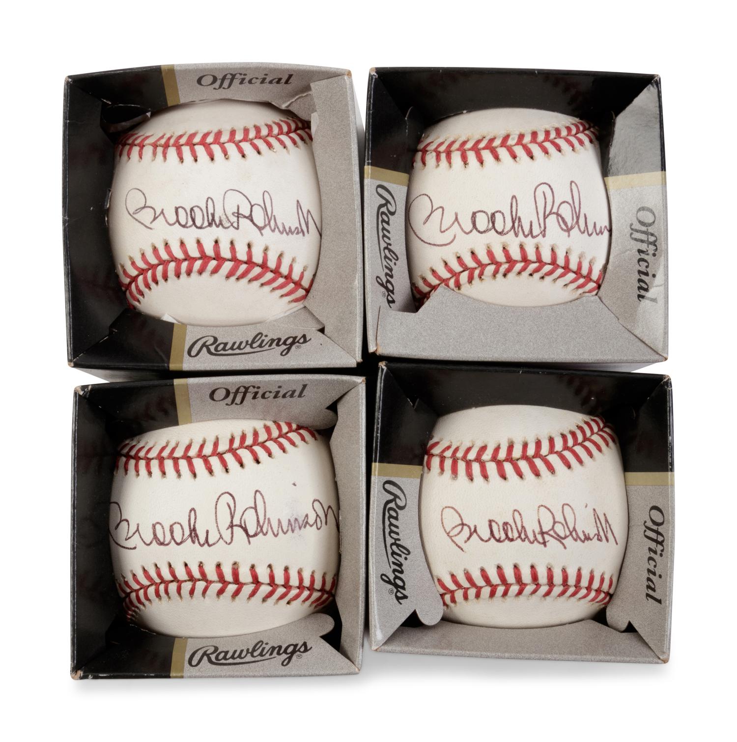 A Group of Four Brooks Robinson Signed Baseballs,