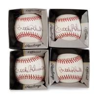 A Group of Four Brooks Robinson Signed Baseballs,