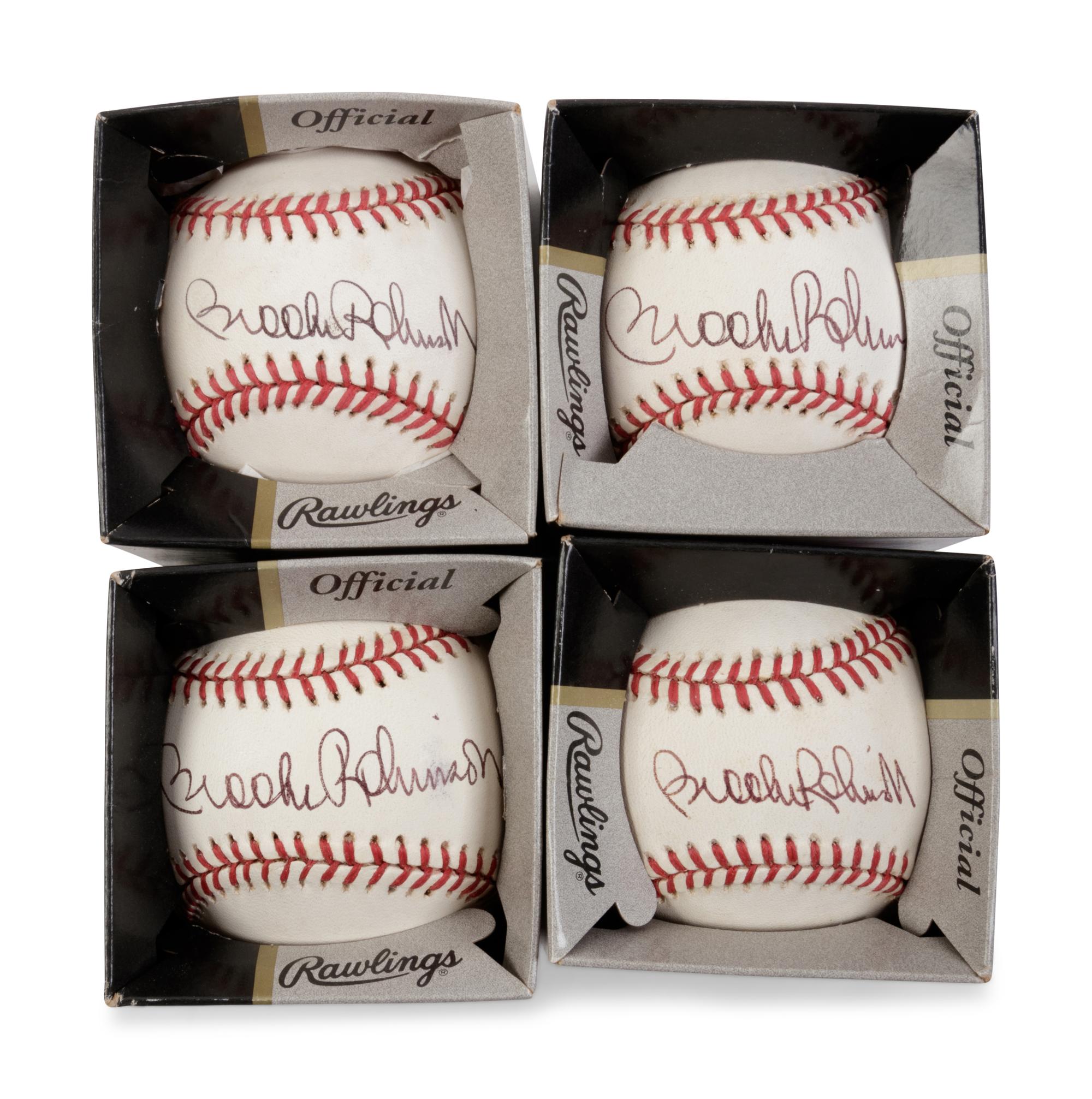 A Group of Four Brooks Robinson Signed Baseballs,