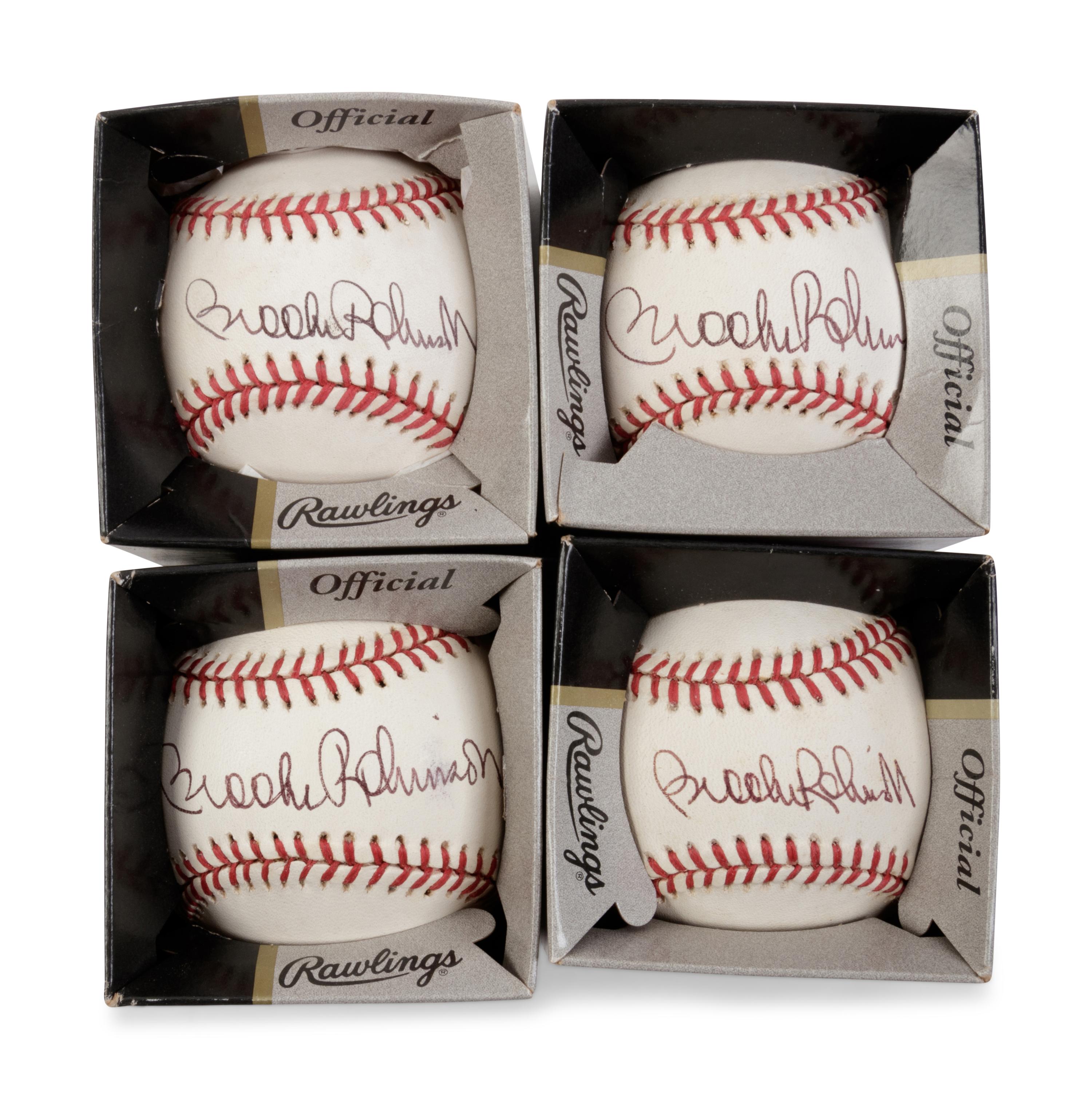A Group of Four Brooks Robinson Signed Baseballs,