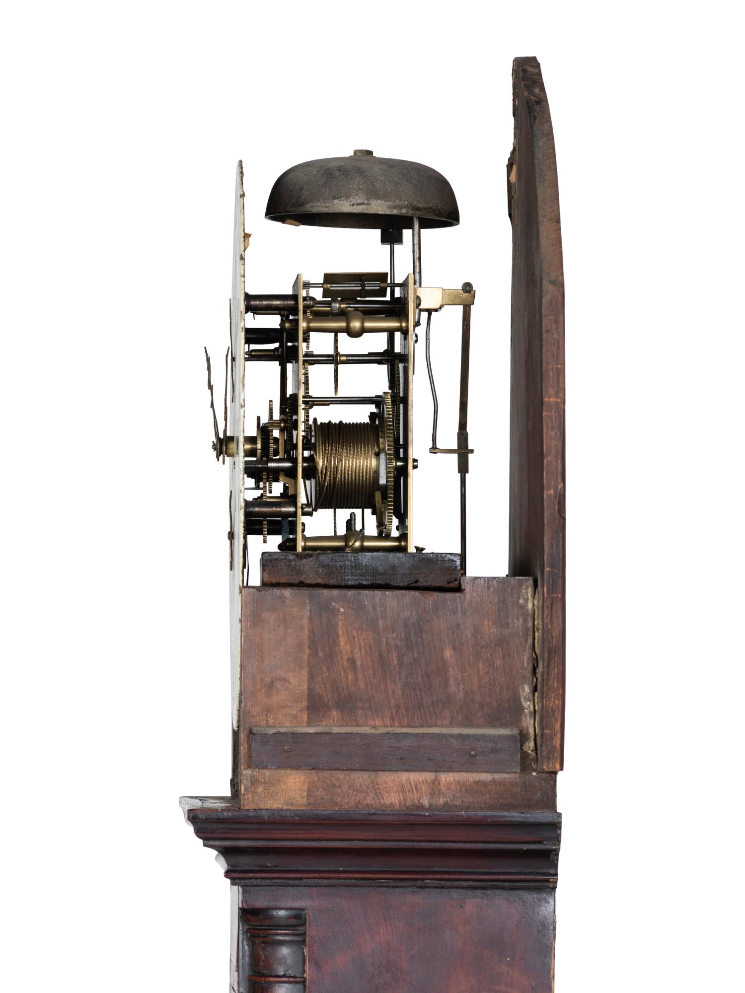 A Chippendale Inlaid and Figured Mahogany Tall Case Clock