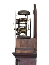 A Chippendale Inlaid and Figured Mahogany Tall Case Clock