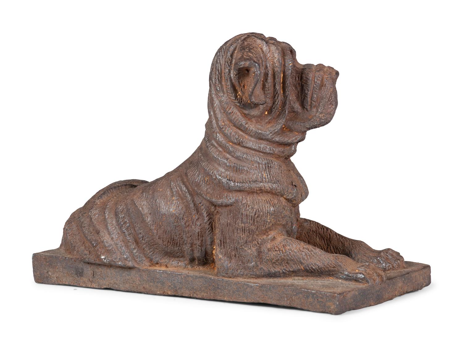 A Cast Iron Reclining Mastiff