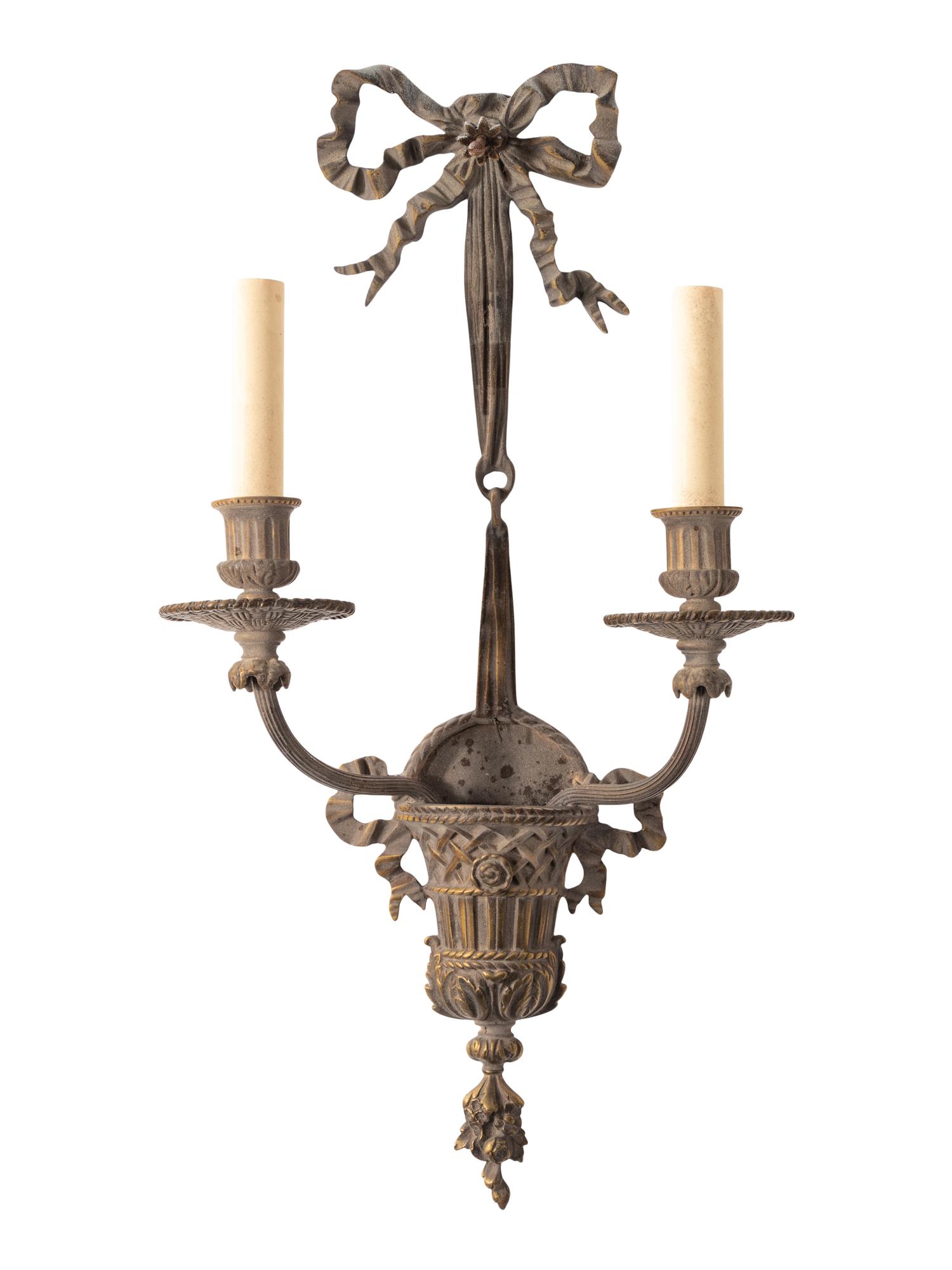 A Set of Four Louis XVI Style Gilt Bronze Two-Light Sconces