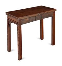 A George III Mahogany Blind Fret Carved Flip-Top Table