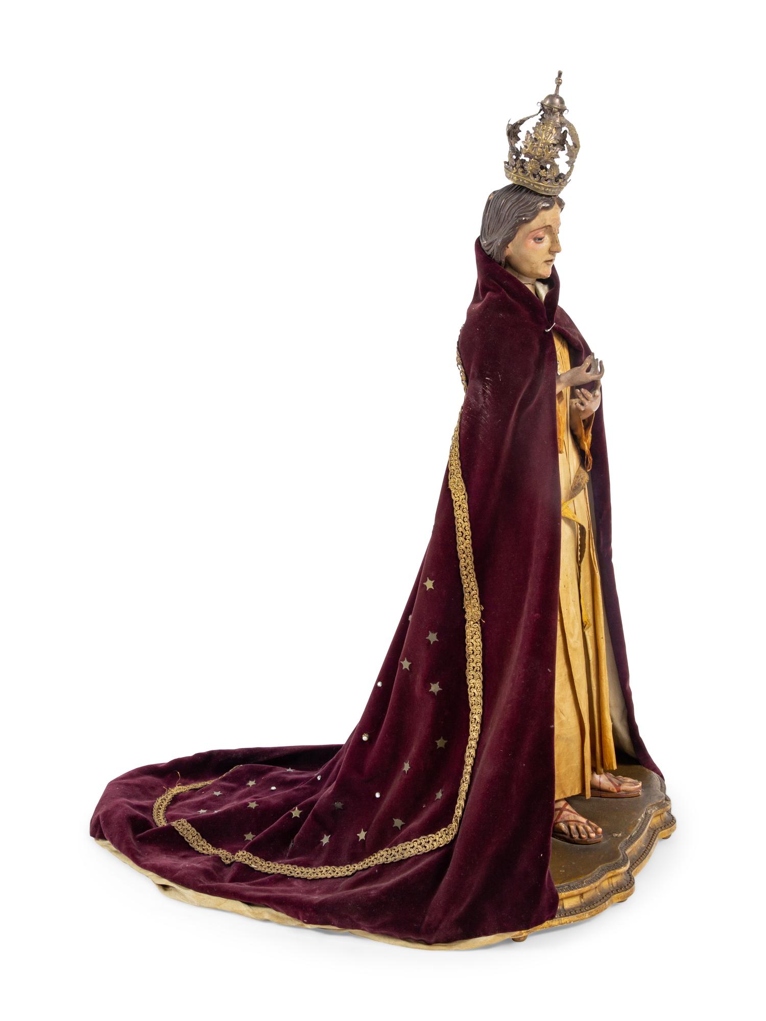 A Continental Painted Figure of a Saint