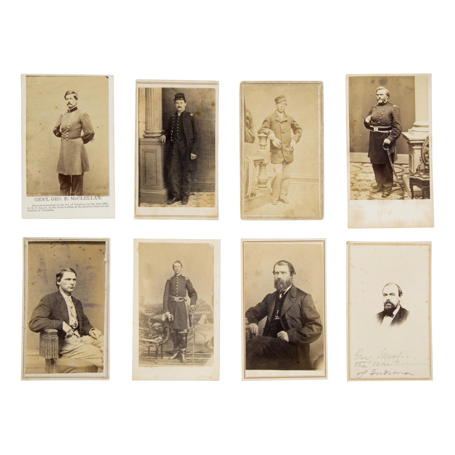 [Civil War]. A group of Civil War-era CDV albums and post-war reunion badges.