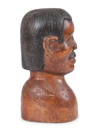 A Carved and Painted Wood Bust of a Mustachioed Man