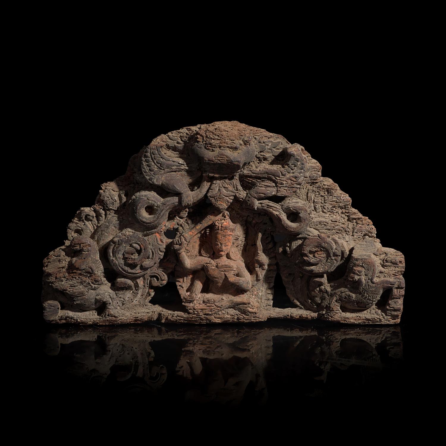 A Nepalese Carved Wood Torana Crest, 17th/18th Century or Earlier