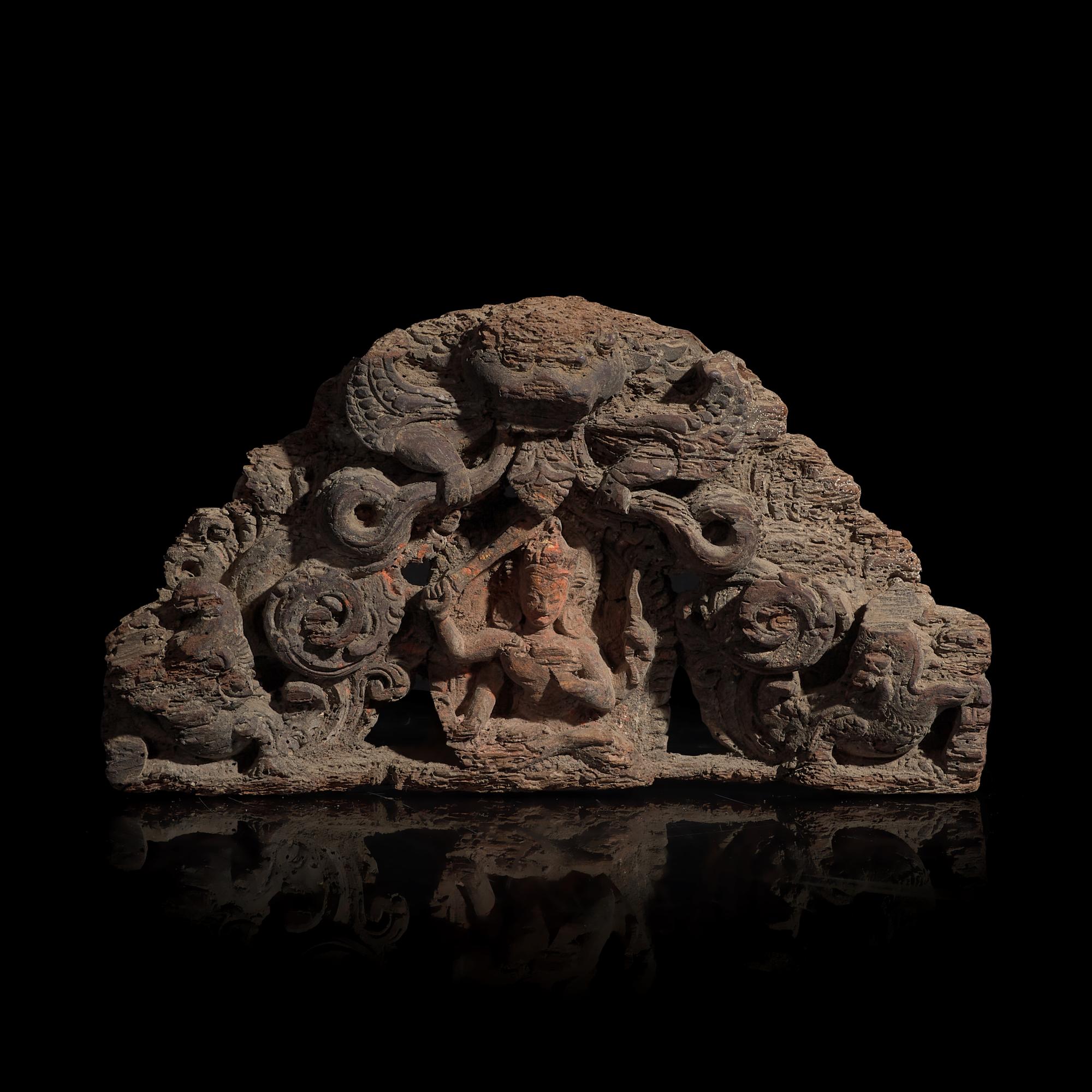 A Nepalese Carved Wood Torana Crest, 17th/18th Century or Earlier