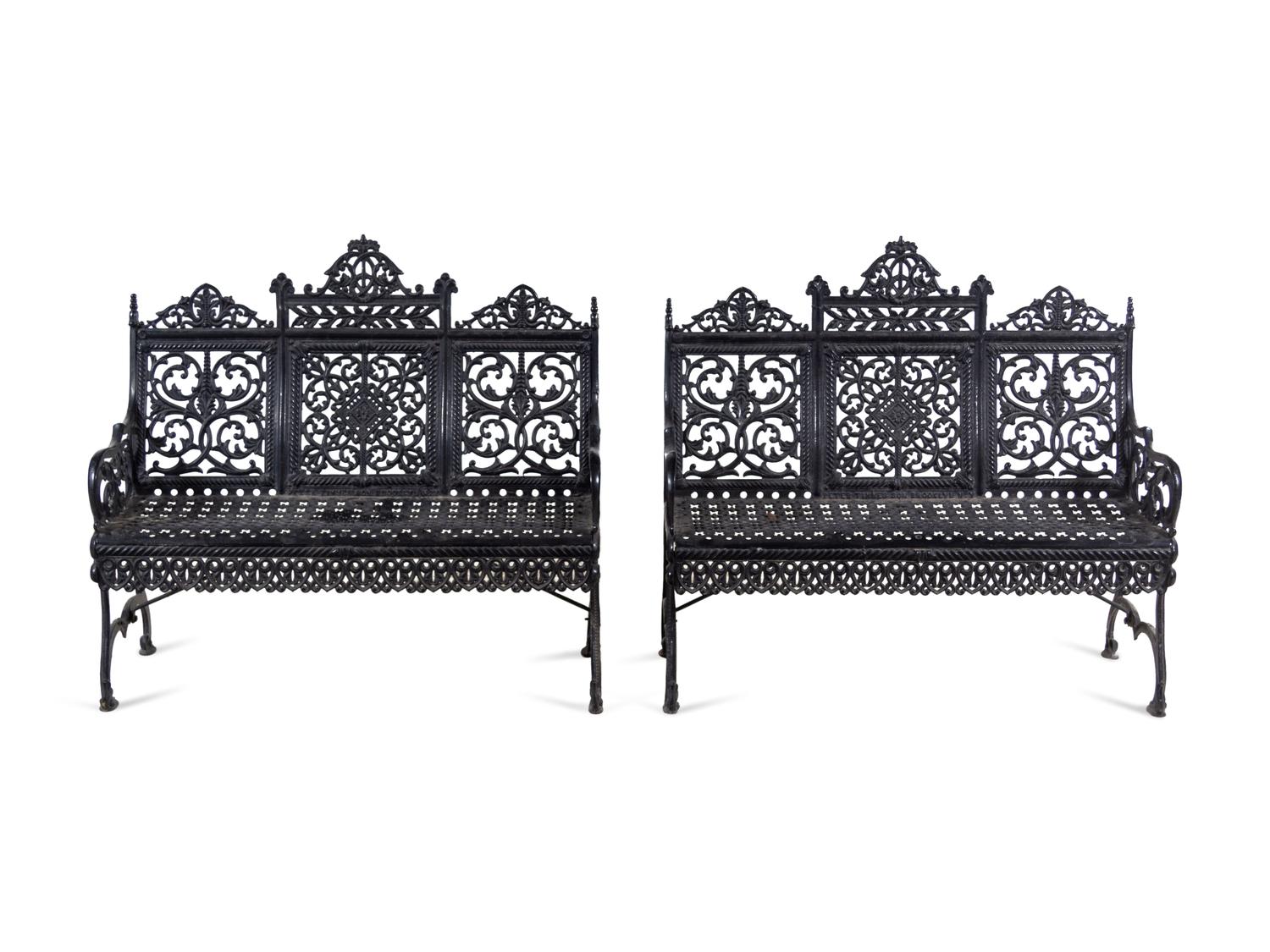 A Pair of American Gothic Revival Painted Cast Iron Garden Benches