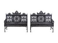 A Pair of American Gothic Revival Painted Cast Iron Garden Benches