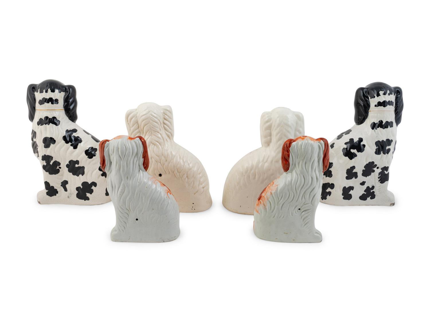 Three Pairs of English Staffordshire Seated Spaniels — 19TH/20TH CENTURY