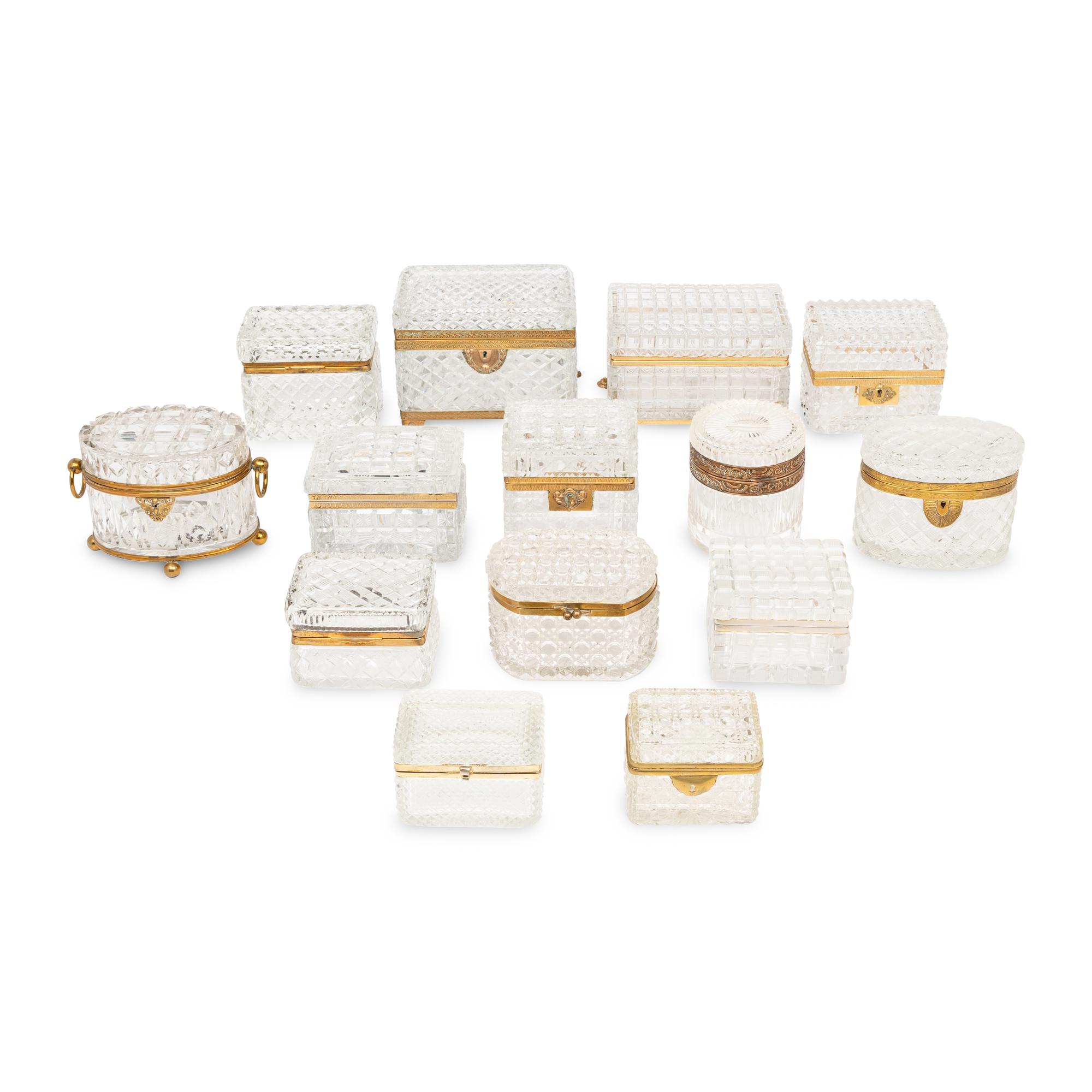 A Collection of Fourteen French Cut Glass and Gilt Metal Table Caskets