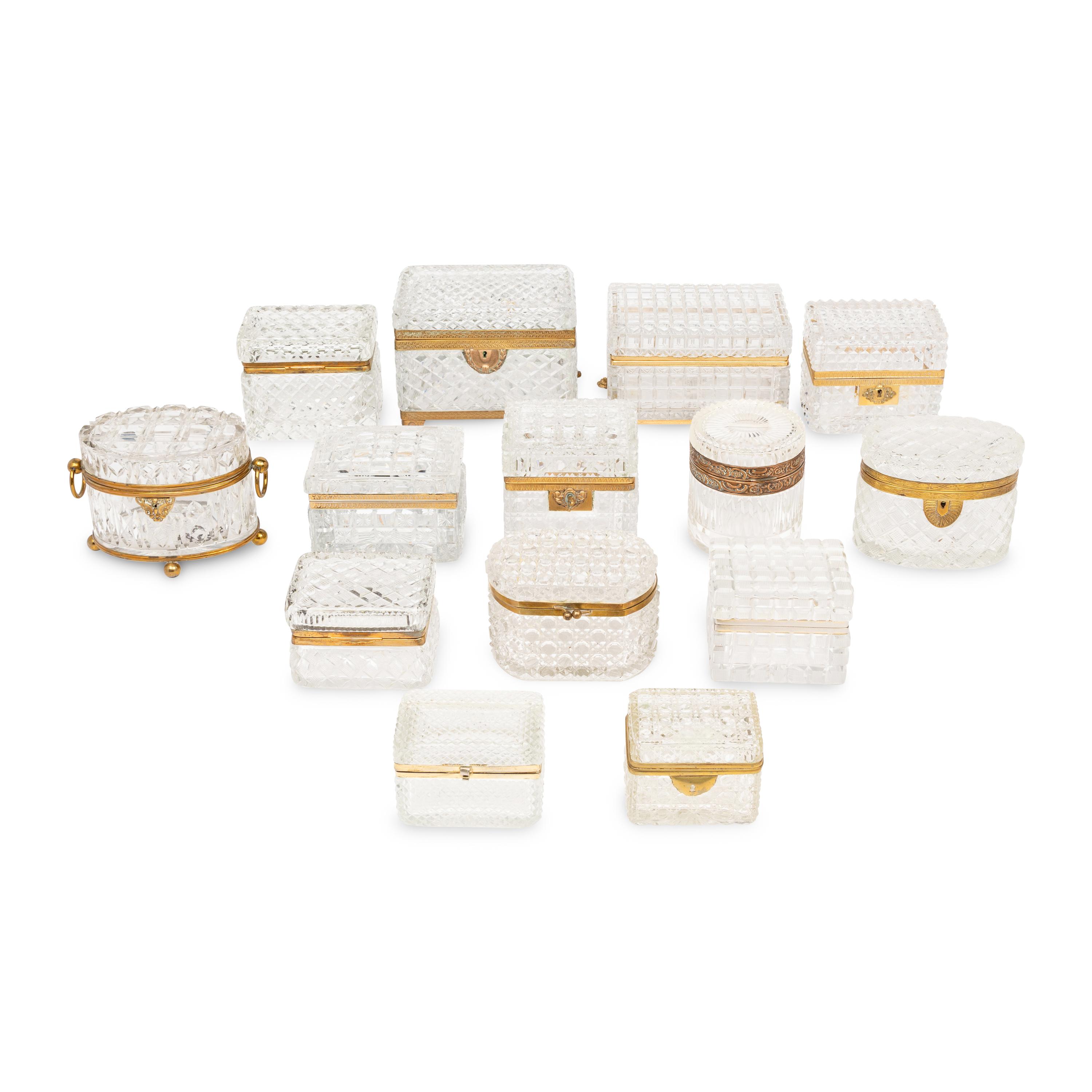 A Collection of Fourteen French Cut Glass and Gilt Metal Table Caskets