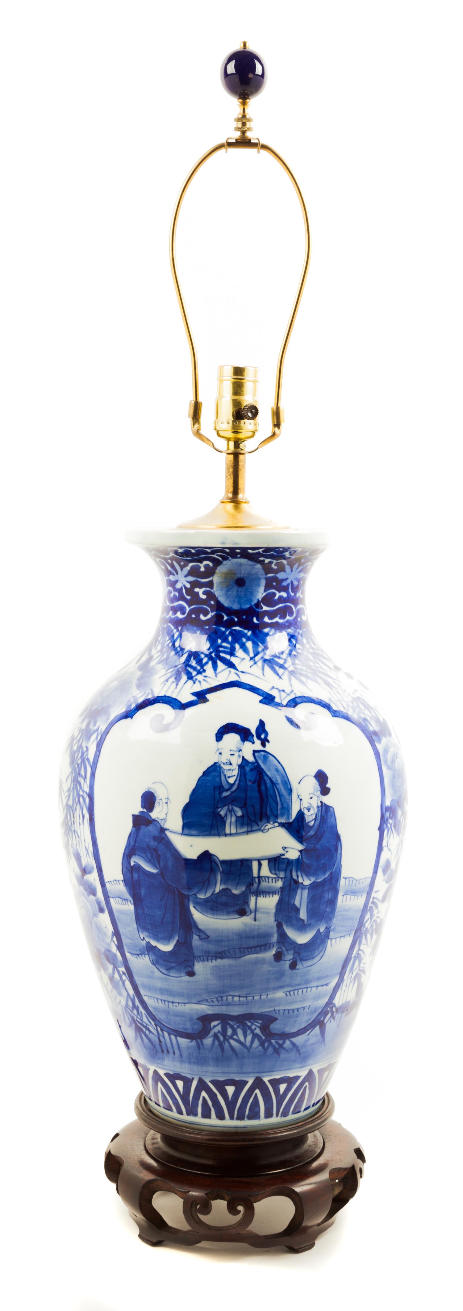 A Chinese Blue and White Porcelain Vase Height 17 1/2 inches.