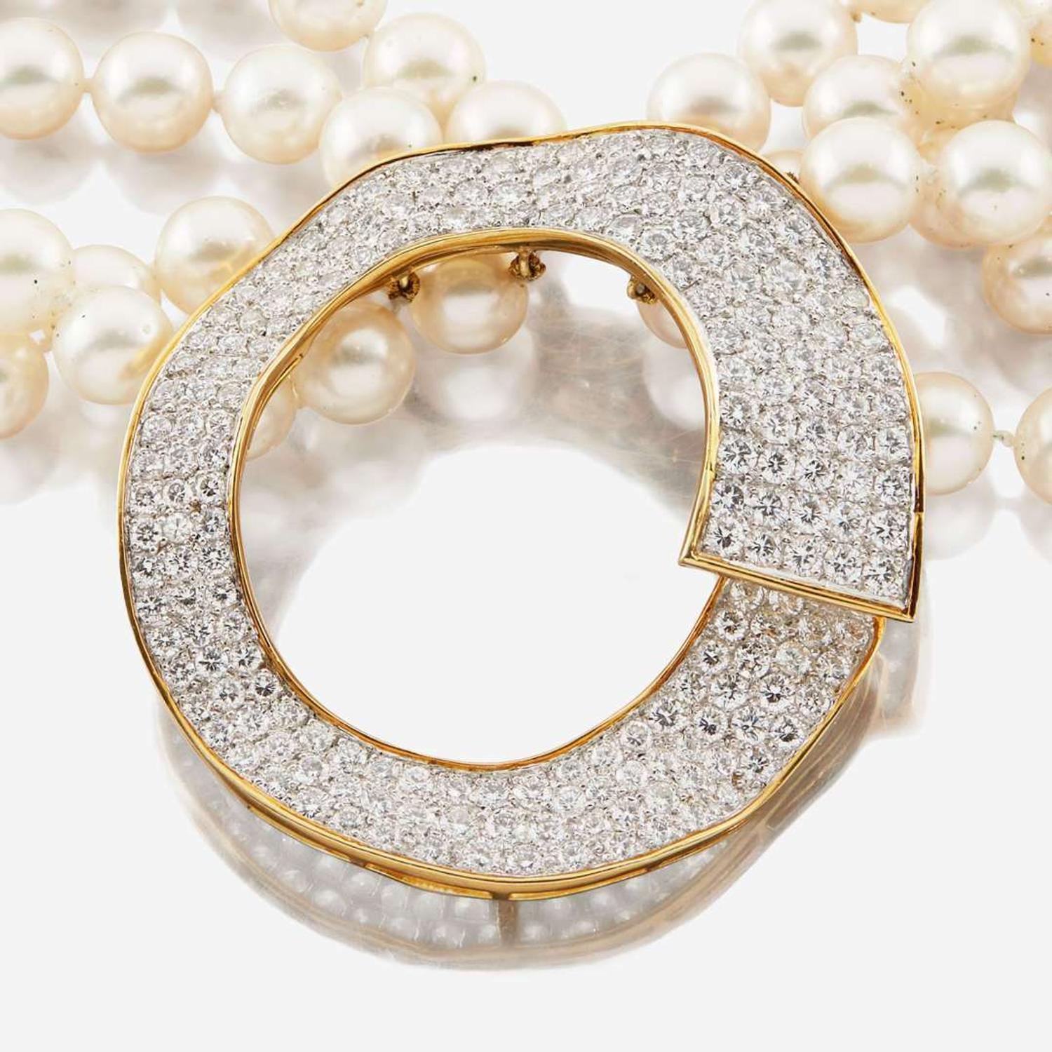 A cultured pearl, diamond, gold, and platinum necklace