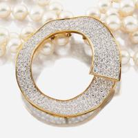 A cultured pearl, diamond, gold, and platinum necklace