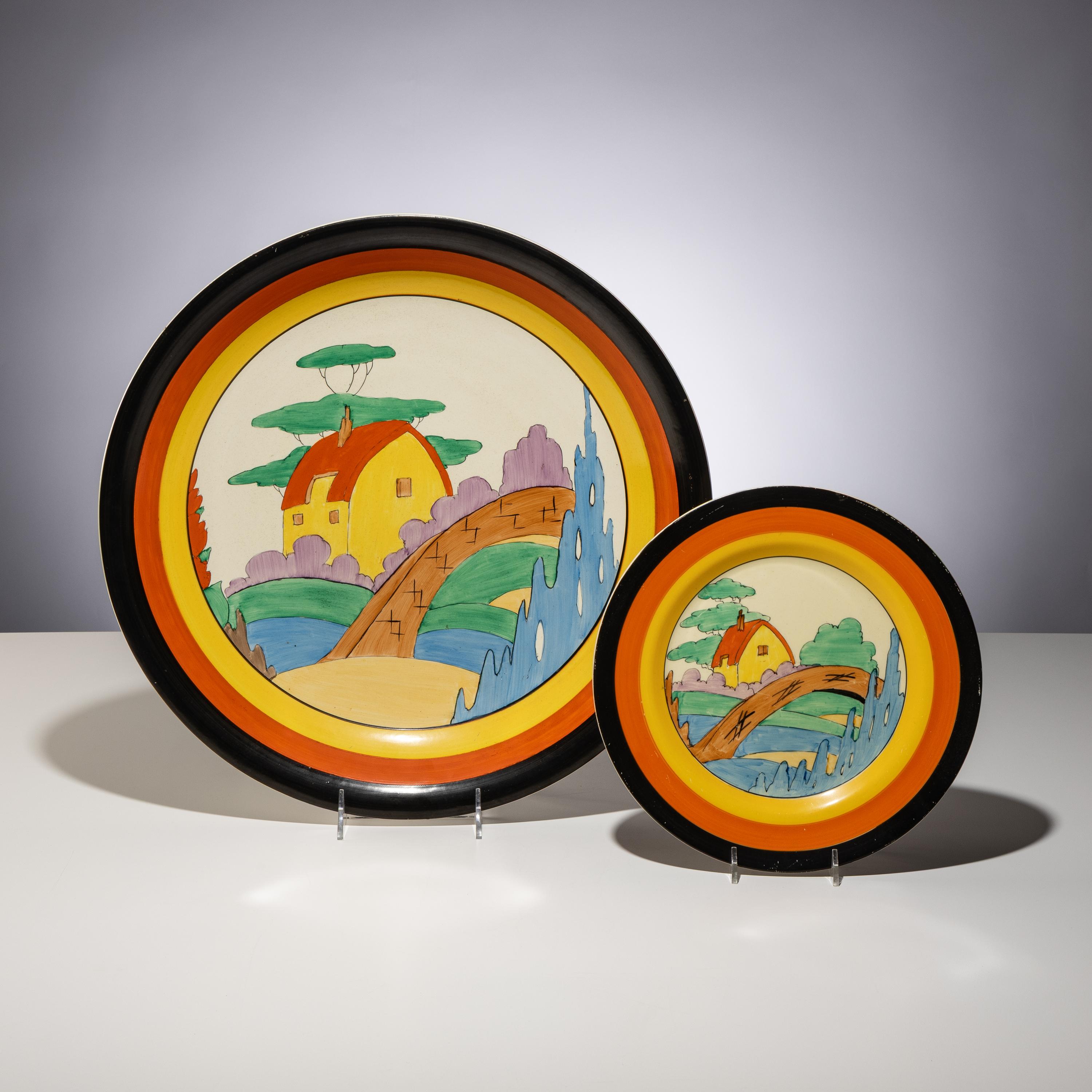 Clarice Cliff (English, 1899–1972) — Two Orange Roof Cottage pattern Platters
