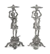 A Pair of Silvered Metal Figures