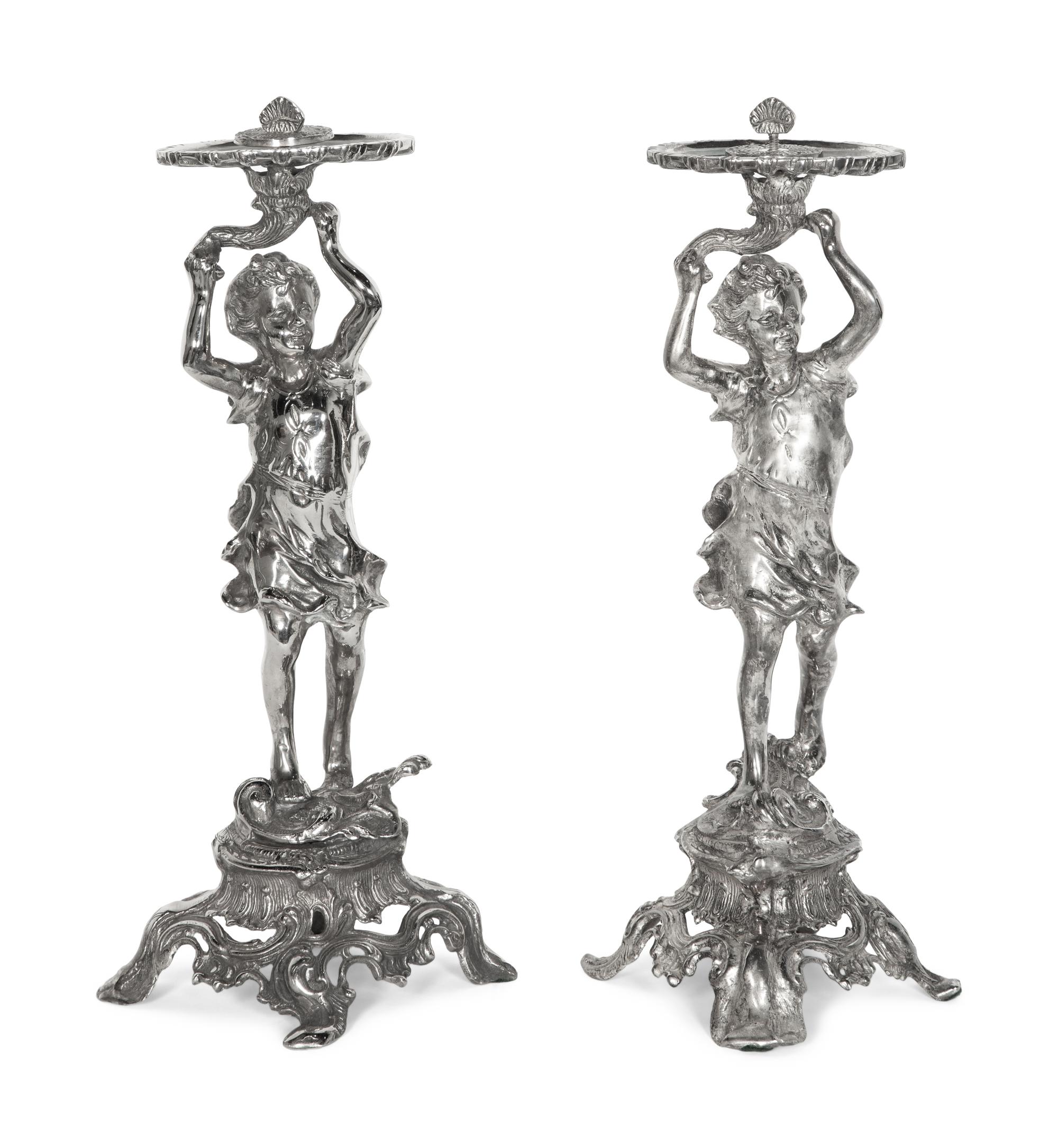 A Pair of Silvered Metal Figures