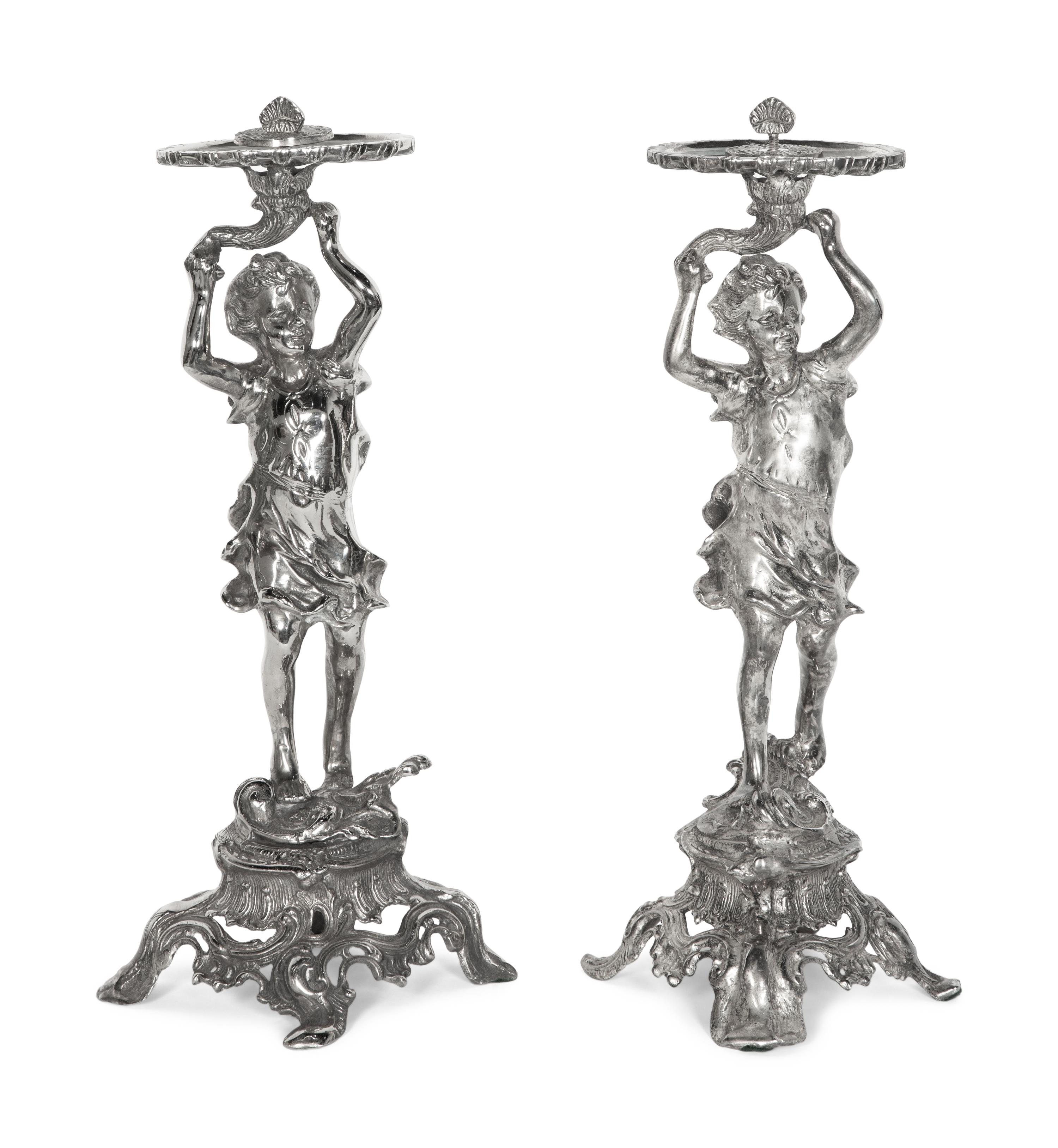 A Pair of Silvered Metal Figures