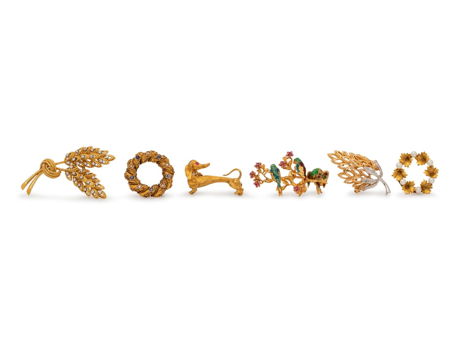 A Collection of Yellow Gold Brooches,