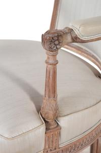 A Pair of Louis XVI Limed Beech Fauteuils