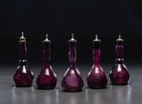 Five 'Mary Gregory' Amethyst Glass Barber Bottles